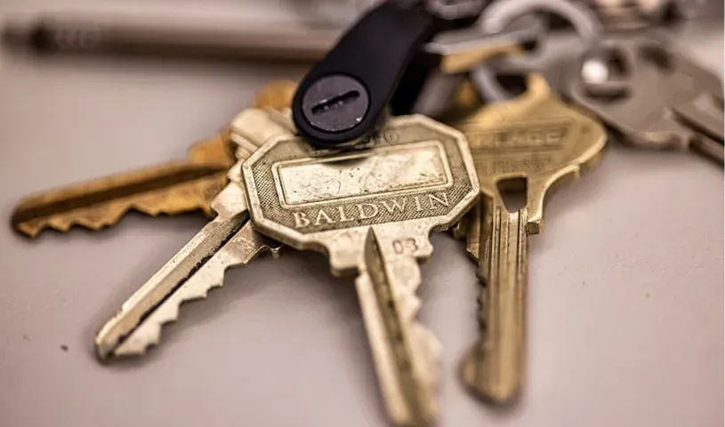 Automotive locksmith preparing replacement smart key equipment